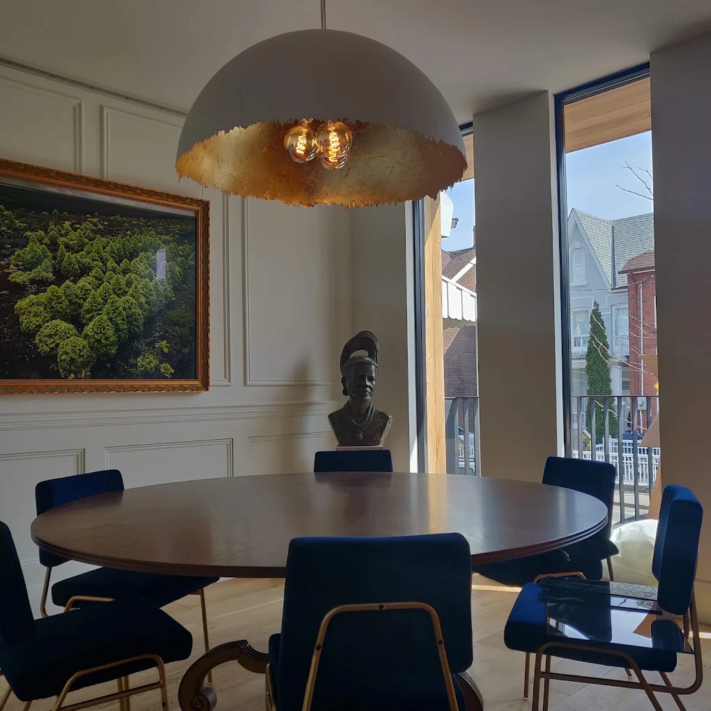 Installed pendant lighting over a dining table